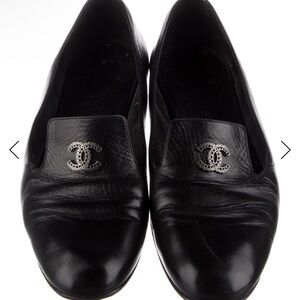 CHANEL Black Leather Flats with Silver Logo